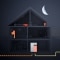 The picture illustrates the operation of a Viessmann fuel cell heating system at night.