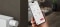 The image shows a hand with a smartphone and the ViCare app open on the screen