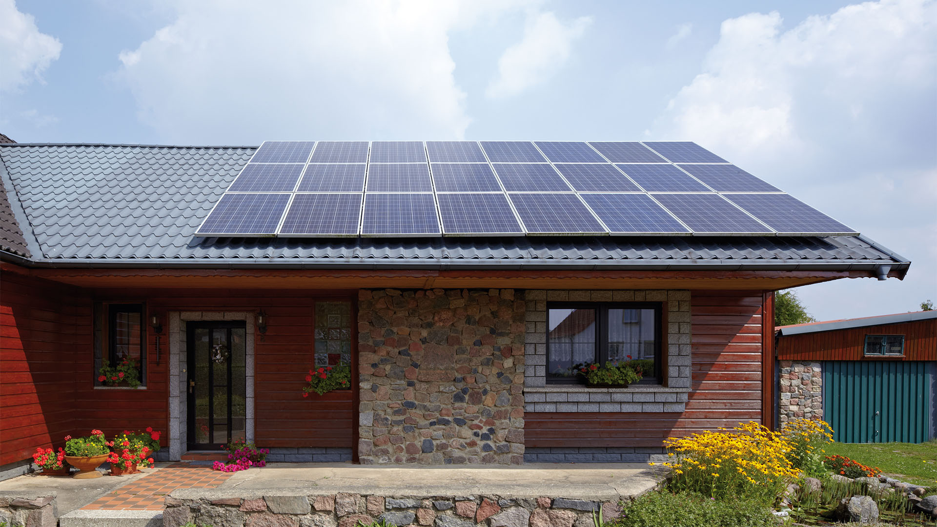 Viessmann Vitocal heat pump paired with solar PV panels for a sustainable UK home.