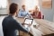 Young couple talking to a Viessmann consultant.