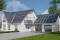 The picture shows a modern house with energy systems such as photovoltaics to generate electricity.