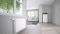 The picture shows a modern home with a ViCare thermostatic radiator valve