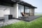 Vitocal heat pump at the edge of a patio.